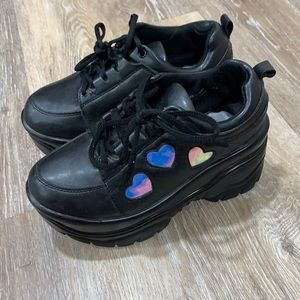 Black platform sneakers